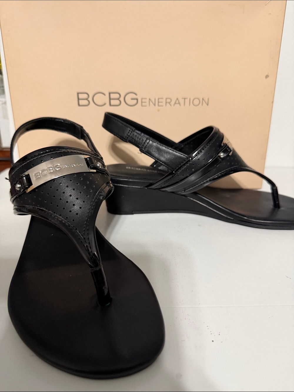 BCBGeneration Black Thong Sandals with Signature Plaque